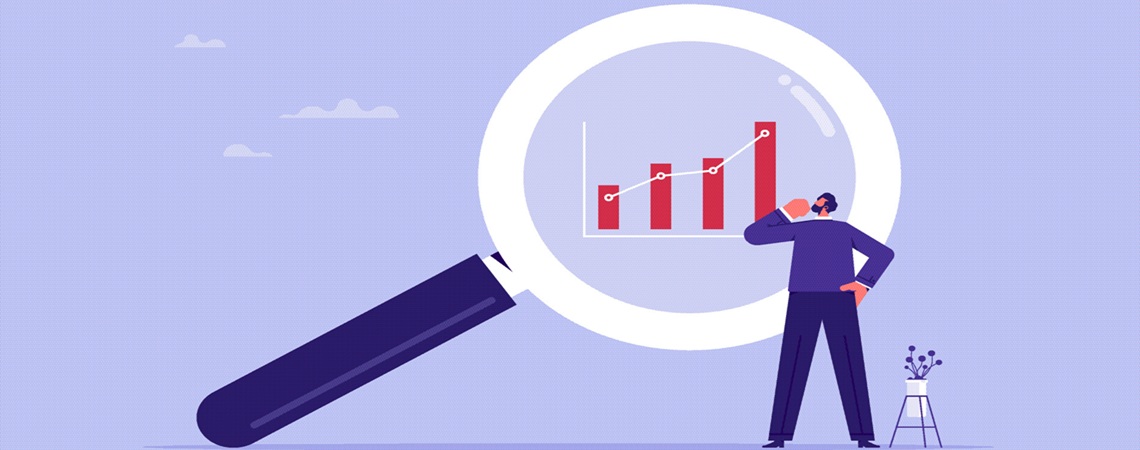 Säulendiagramm auf das eine große Lupe gerichtet ist